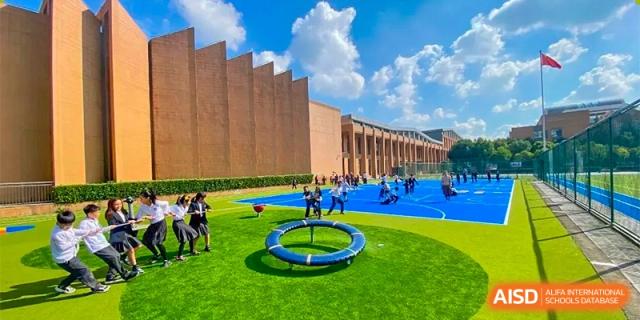 Changwai Bilingual School outdoor sports field, buildings, wide view, school campus, athletics, facilities, recreation.