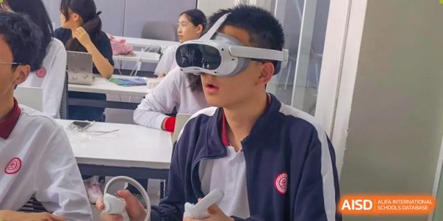 A male student wearing a virtual reality (VR) headset in a classroom at the High School Affiliated to Shanghai Jiao Tong University.