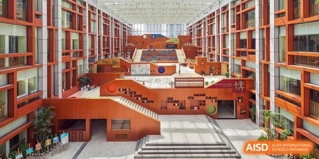 An empty music room or auditorium with rows of seating at Wahaha Bilingual School Hangzhou.