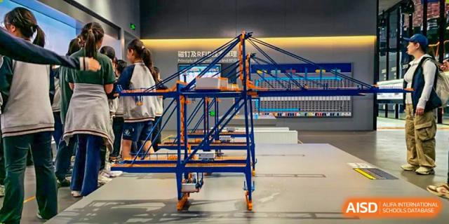 A model of a gantry crane on a field trip or in a classroom at Qingdao Cornerstone Bilingual School.