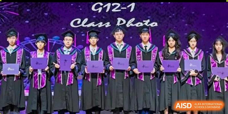 A group of graduating students from Tsinglan School holding their diplomas and posing for a class photo.