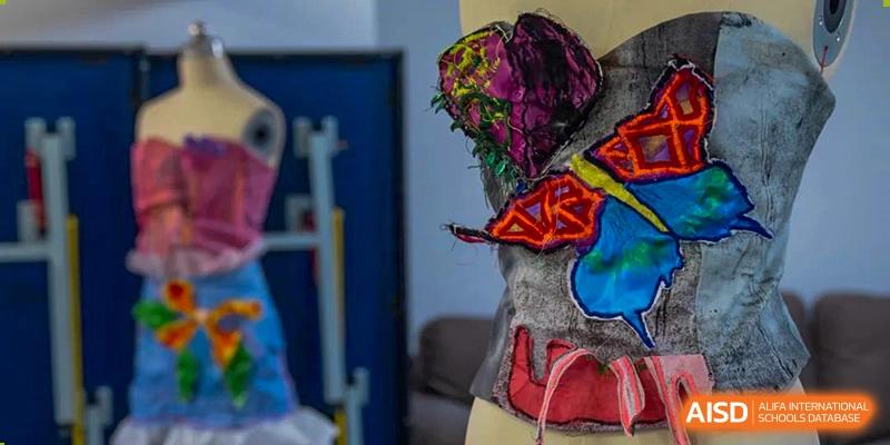 A close-up of a vibrant, colorful hat worn by a performer at Wellington College International Tianjin.