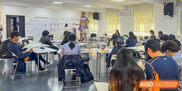 Students gathered in a classroom for a performance or presentation at Yew Wah International Education School of Shanghai Gubei.
