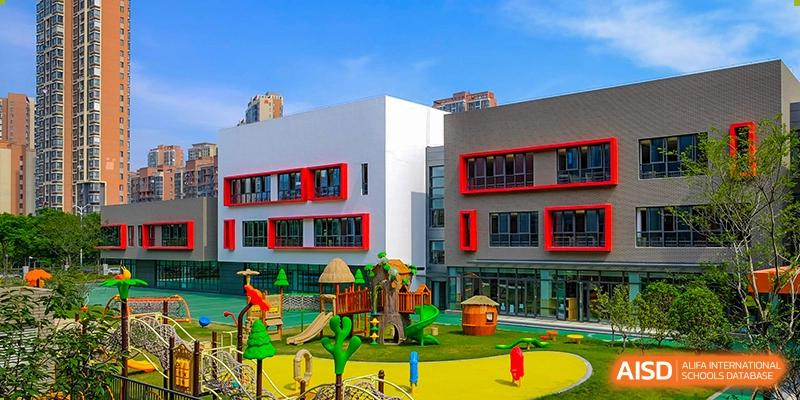A view of the modern school buildings and a playground at Overseas Chinese Academy of Chiway Suzhou.
