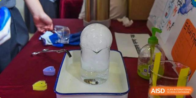 A science experiment with dry ice or gas in a beaker at Wuxi Boston International School.