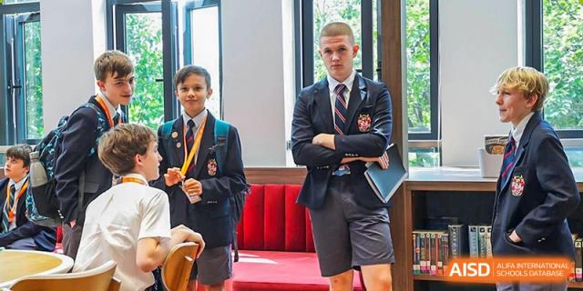 Two students from Dulwich College Shanghai Puxi in their school uniform.