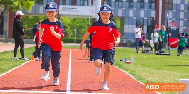 A student from Dulwich College Shanghai Puxi running on a track.