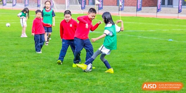 Students from Dulwich College Shanghai Puxi playing soccer.