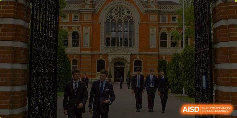 Students from Dulwich College Suzhou walk in front of a large, traditional building.