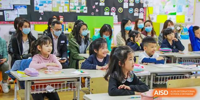 Students in a classroom listening to a lesson at Fuzhou Lakeside International School.