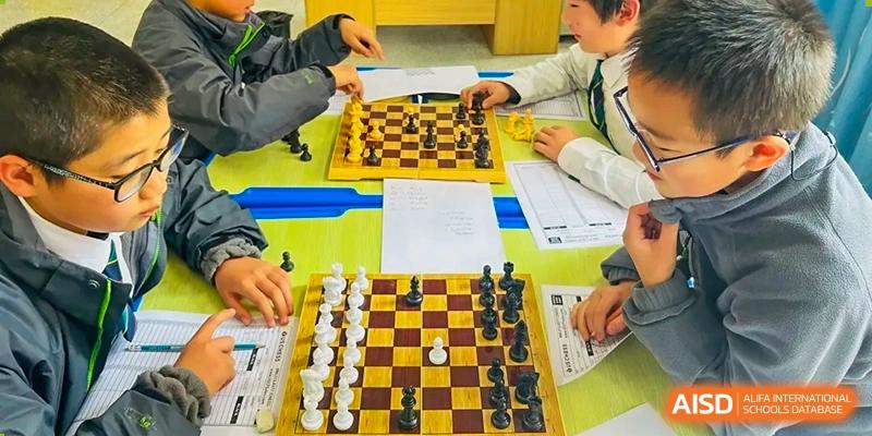 A close-up of a chessboard during a game at Kunming World Youth Academy.