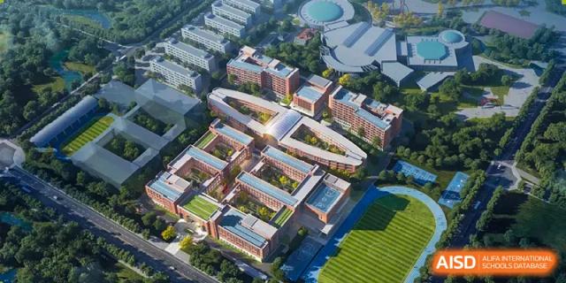 An aerial view of a large, modern campus with multiple buildings and courtyards at Sino-Canada School.