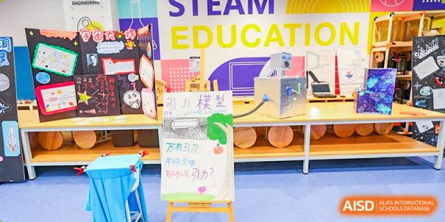 A small display with a sign that reads "STEAM EDUCATION." Guangzhou International Primary/Middle School Huangpu