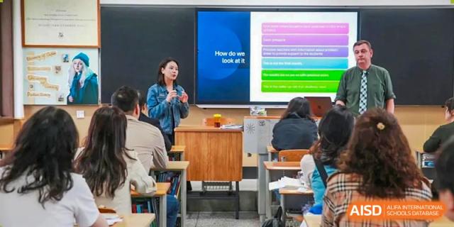 Chengdu Shishi High School Cambridge A-Level Centre teacher gives a lesson to students in a classroom.