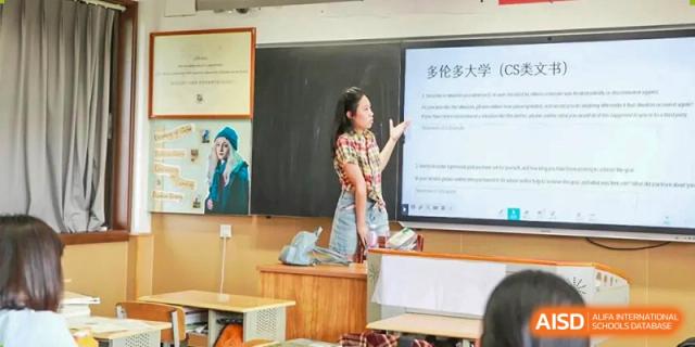 Chengdu Shishi High School Cambridge A-Level Centre student gives a presentation in a classroom.