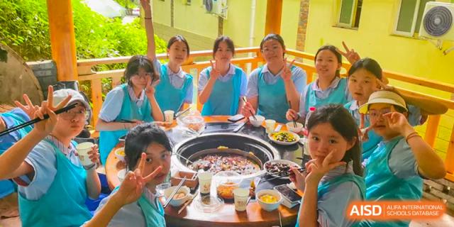 Chengdu Shishi High School Cambridge A-Level Centre students sharing a hot pot meal together.