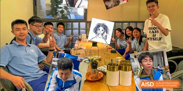 Chengdu Shishi High School Cambridge A-Level Centre students eating together and looking at a drawing.