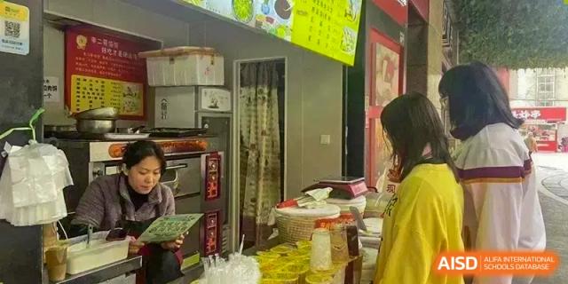 A close-up view of a small food or drink stall at Wuhan Hongshan High School International Department.