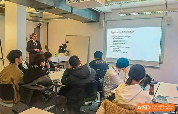 Chengdu No.7 High School International Department students attending a presentation or lecture in a classroom.