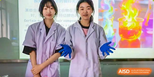 A photo showing students in a lab performing a scientific experiment, at Beijing Foreign Studies University International Curriculum Center.