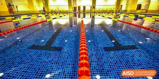A swimming pool from Shijingshan School of The High School Affiliated to Renmin University of China with lane markers.
