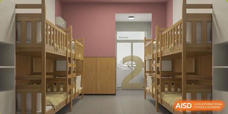 An interior shot of a quiet study or library area at Changsha Lushan Zhongjia School, showing wooden bookshelves and a large number '2' visible in the background.