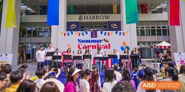 People enjoying the "Summer Carnival" at Harrow International School Shanghai.