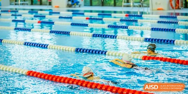 A close-up view of the swimming lanes inside the indoor pool at ISA Science City International School.