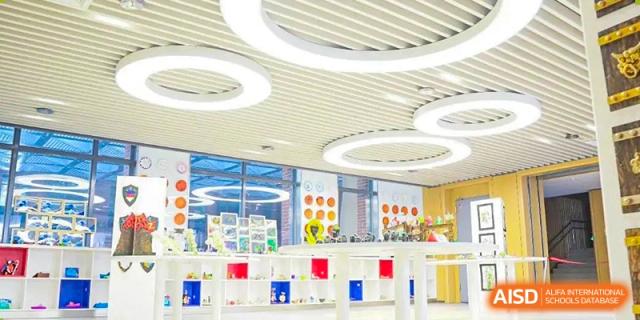 An empty and brightly lit library or study area at NANJING THOMAS SCHOOL.