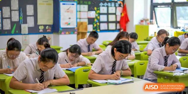 Students from Rugao International Academy BFSU working at their desks.