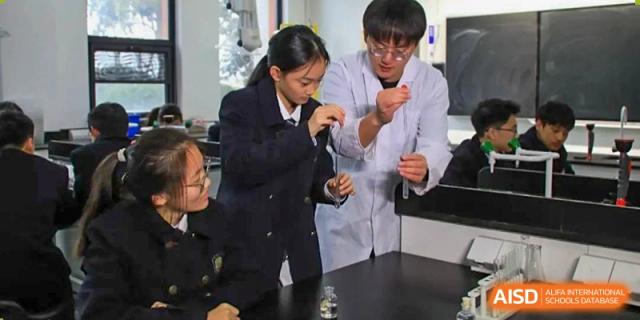 A teacher and students from Rugao International Academy BFSU conducting a science experiment.
