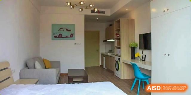 A clean and modern kitchen area at Rugao International Academy BFSU.