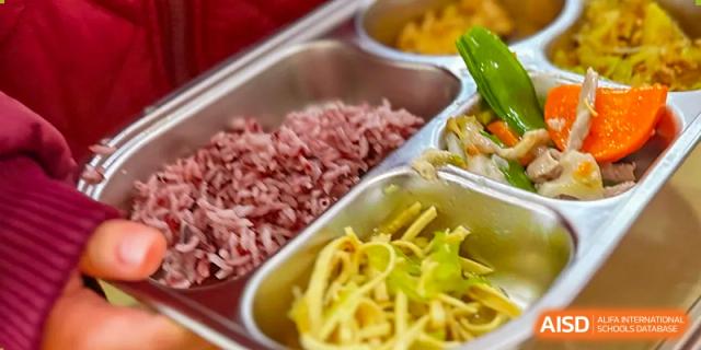 A school lunch tray with different types of food at SUZHOU INTERNATIONAL FOREIGN LANGUAGE SCHOOL.
