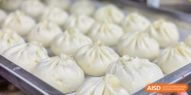 A close-up shot of steamed buns at SUZHOU INTERNATIONAL FOREIGN LANGUAGE SCHOOL.