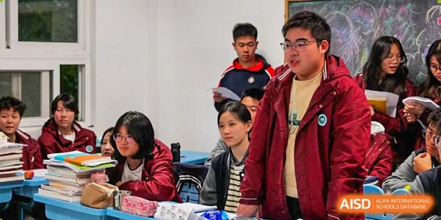 A group of students at The Experimental School Affiliated to Nanjing Normal University in a classroom.