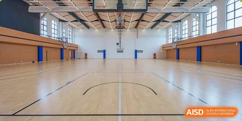 An empty indoor basketball court at Wycombe Abbey School Nanjing.