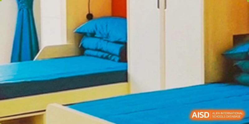 A close-up of a cozy, modern bunk bed in a dormitory room at Wycombe Abbey School Nanjing.