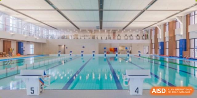 An indoor swimming pool at Wycombe Abbey School Nanjing with marked lanes.