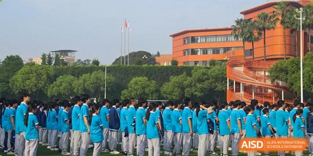 Xiamen Yingcai school students lined up outside the school building.