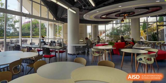 A view of the modern, spacious dining area or cafe inside Wuhan Weiming Senior High School.