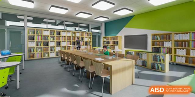 Students working or reading in the bright, modern library or self-study area at Wuhan Weiming Senior High School.
