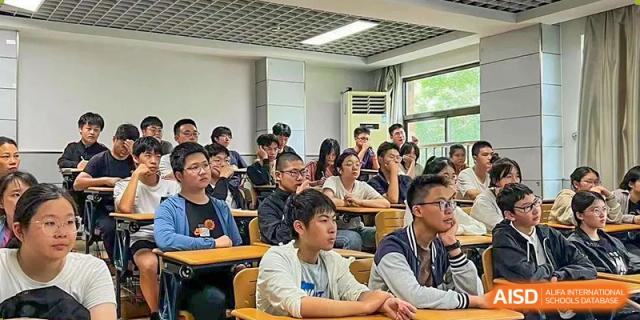 A classroom full of students attentively listening to a lecture or class discussion at Wuxi No.1 High School.