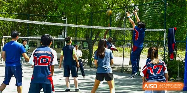 AISB-Hope International students engaged in an outdoor physical activity, possibly playing a sport.