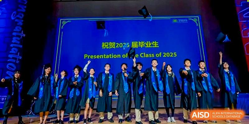 DAYSTAR ACADEMY graduates in blue robes cheering and celebrating on stage at their graduation ceremony.