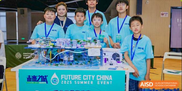 A group of students smiling and posing with a complex model they built for a science or future city competition, Brilliant Light School SJZ.