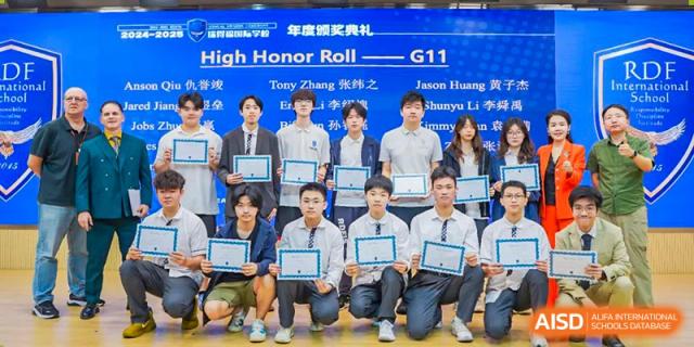 Group portrait of students receiving their High Honor Roll G11 certificates at RDF International School.