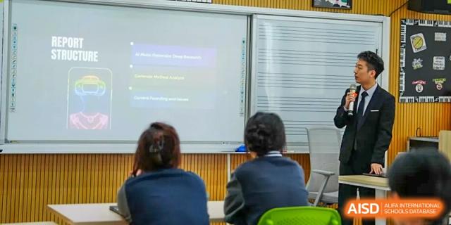 Students attending a class where complex data and a presentation are displayed on a large screen at Shenzhen International Foundation College (SIFC).