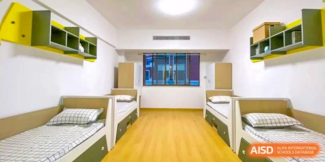 A clean, modern sick bay or health service room interior at Wuxi Huatian Bilingual School.