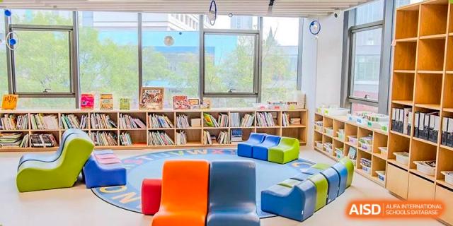 Bright, colorful reading corner in the early childhood library at Yew Wah International Education School of Zhejiang Tongxiang.