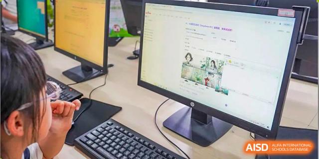 A close-up of a desktop computer screen displaying an educational website or online learning materials, representing virtual learning at Suzhou Foreign Language School.
